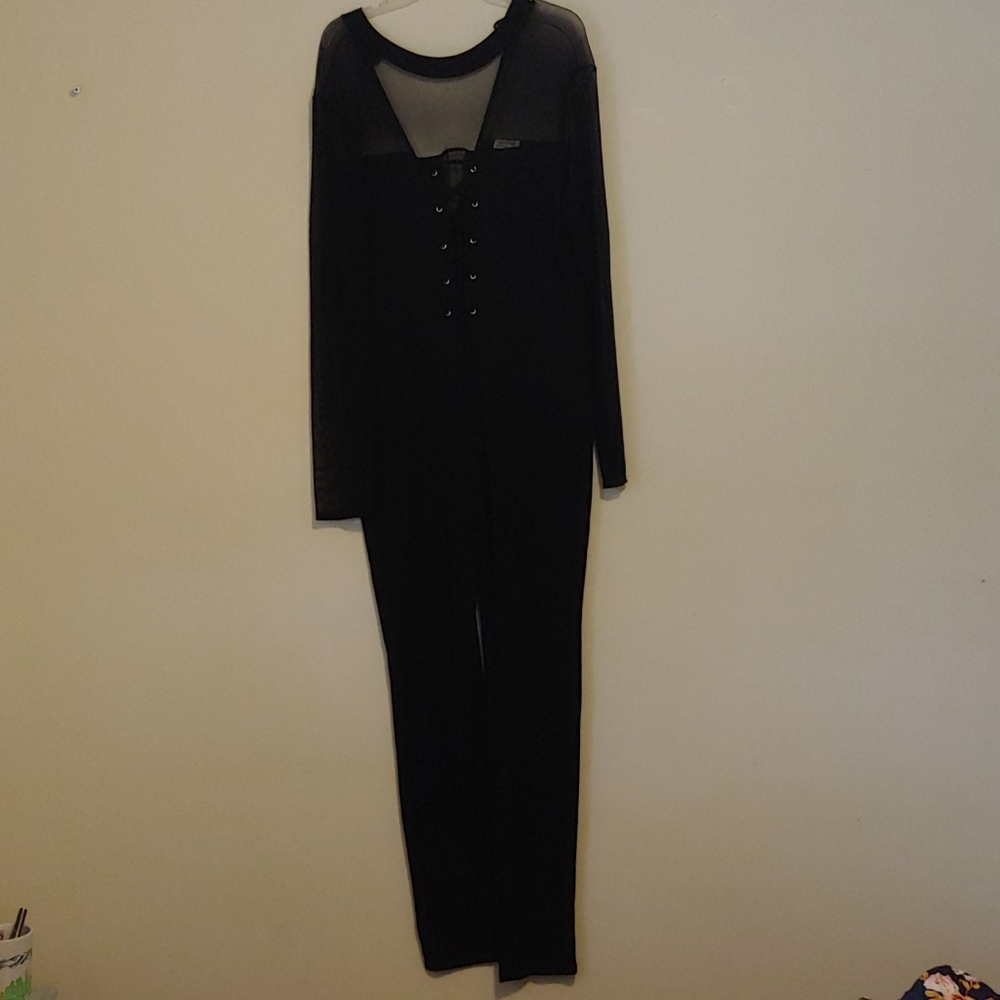 Plus black jumpsuit with sheer arms